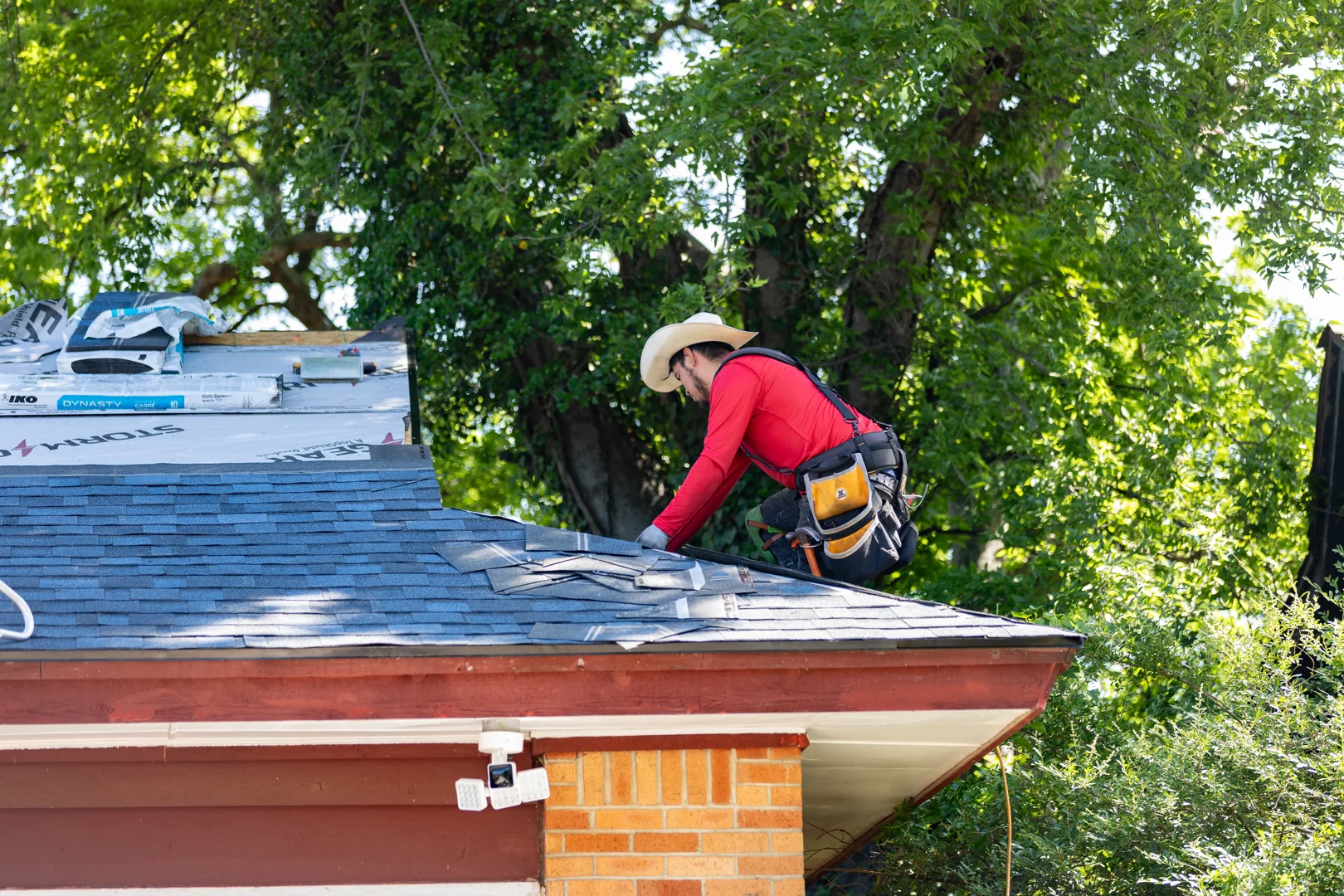 asphalt shingle roofing on modern residential home